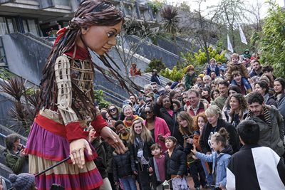 Little Amal greets visitors in Camden, London. Photo courtesy of The Walk Productions.